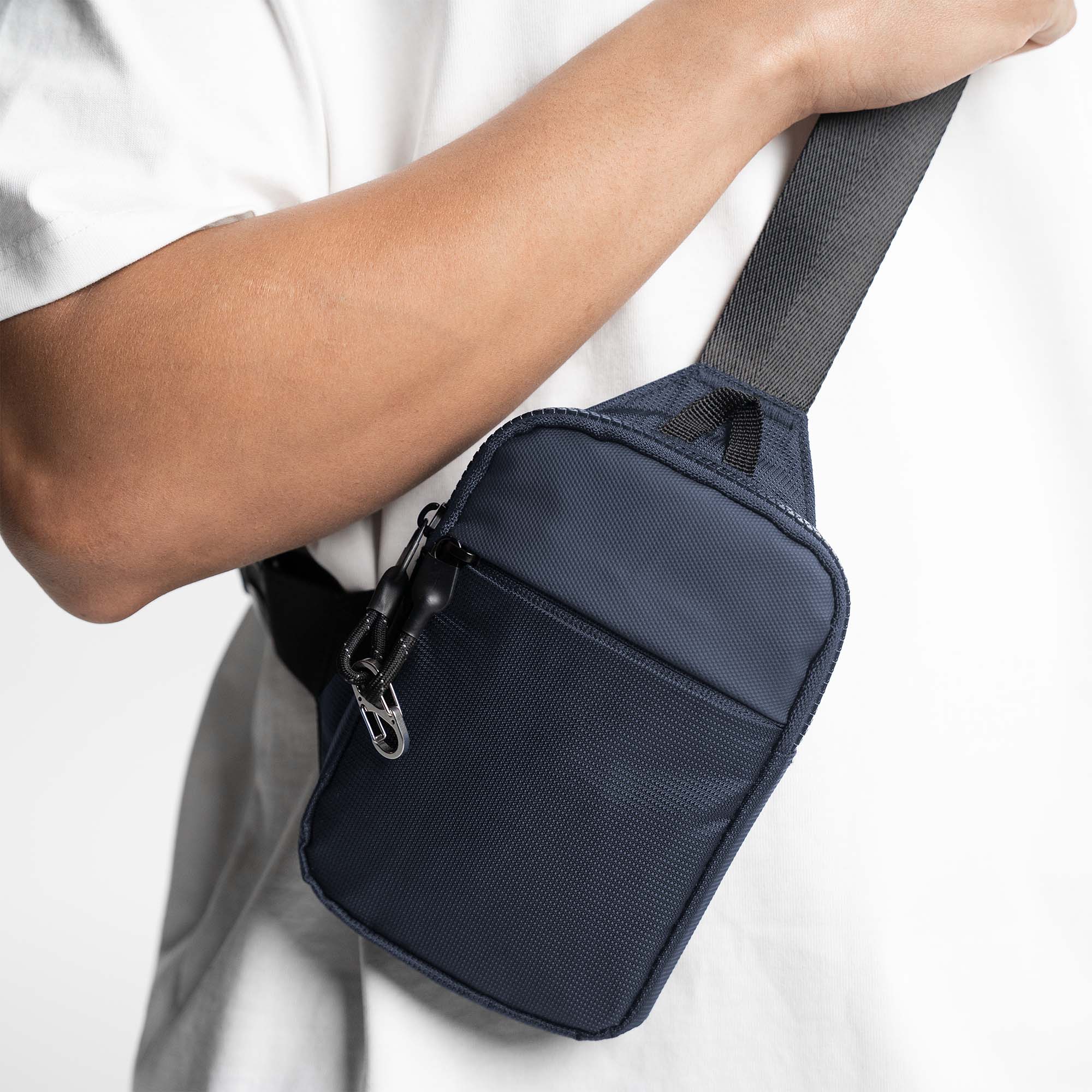 NAVY BLUE TRAVEL SLING BAG